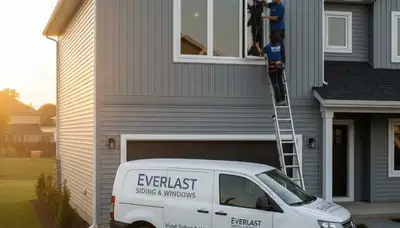 Vinyl siding and window repair experts at work in Indianapolis, IN home exterior renovation